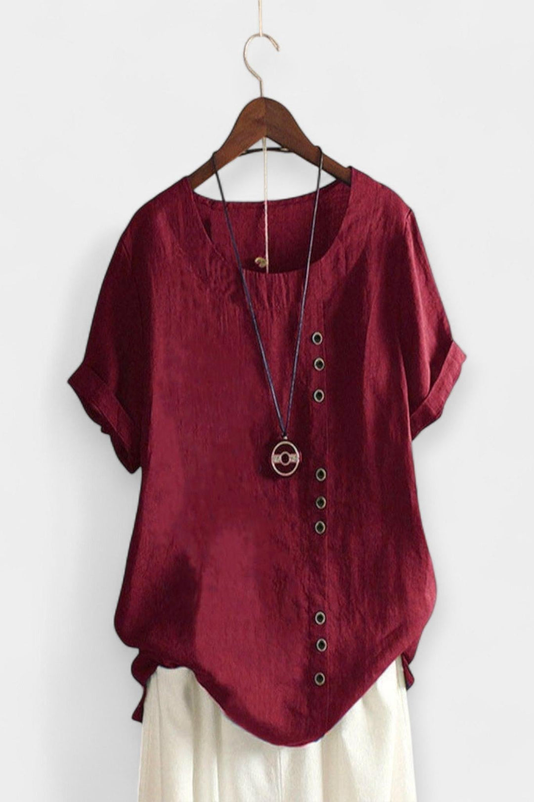 Maglietta a maniche corte con bottoni