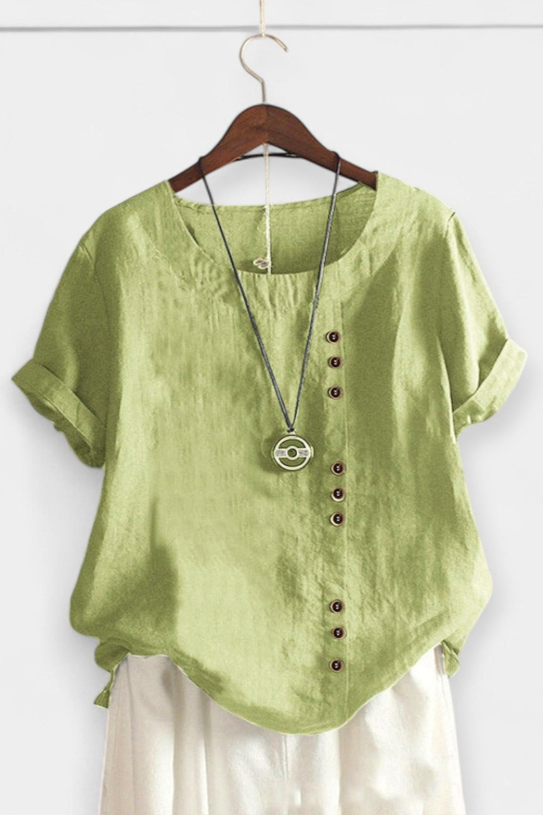 Maglietta a maniche corte con bottoni