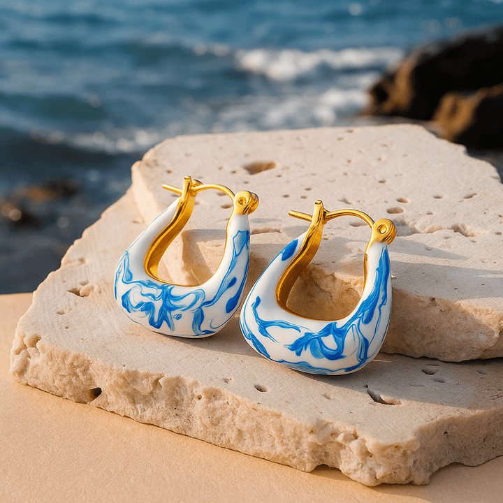 Orecchini piumati color Kullansävy