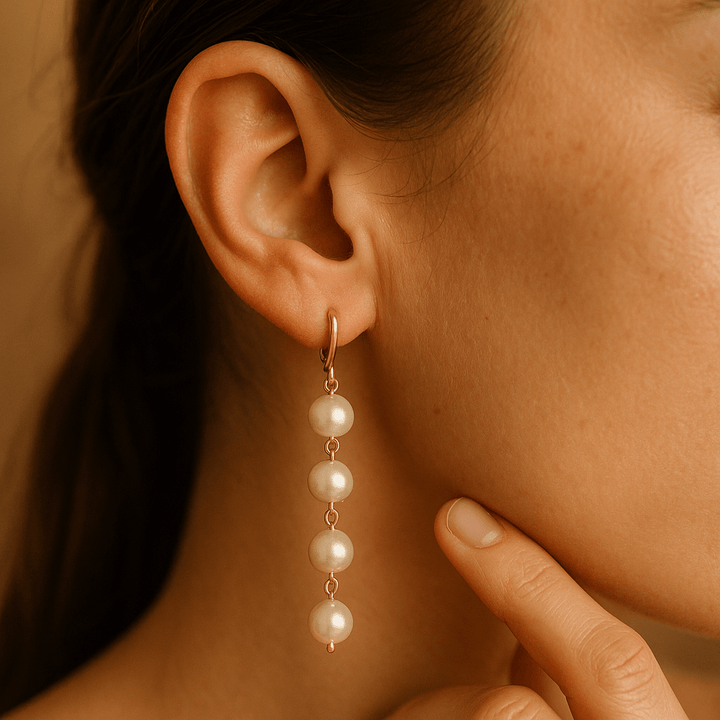 Orecchini con pendente e perla