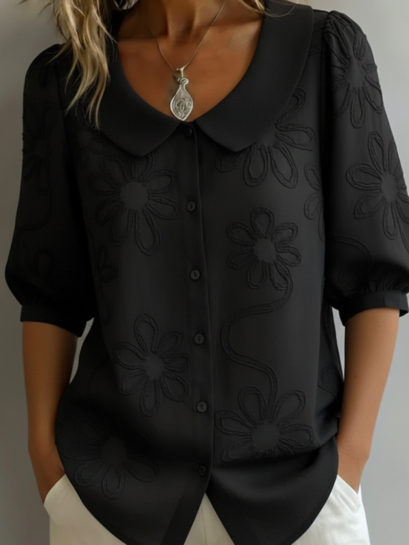 Sara – Blusa con fiori ricamati