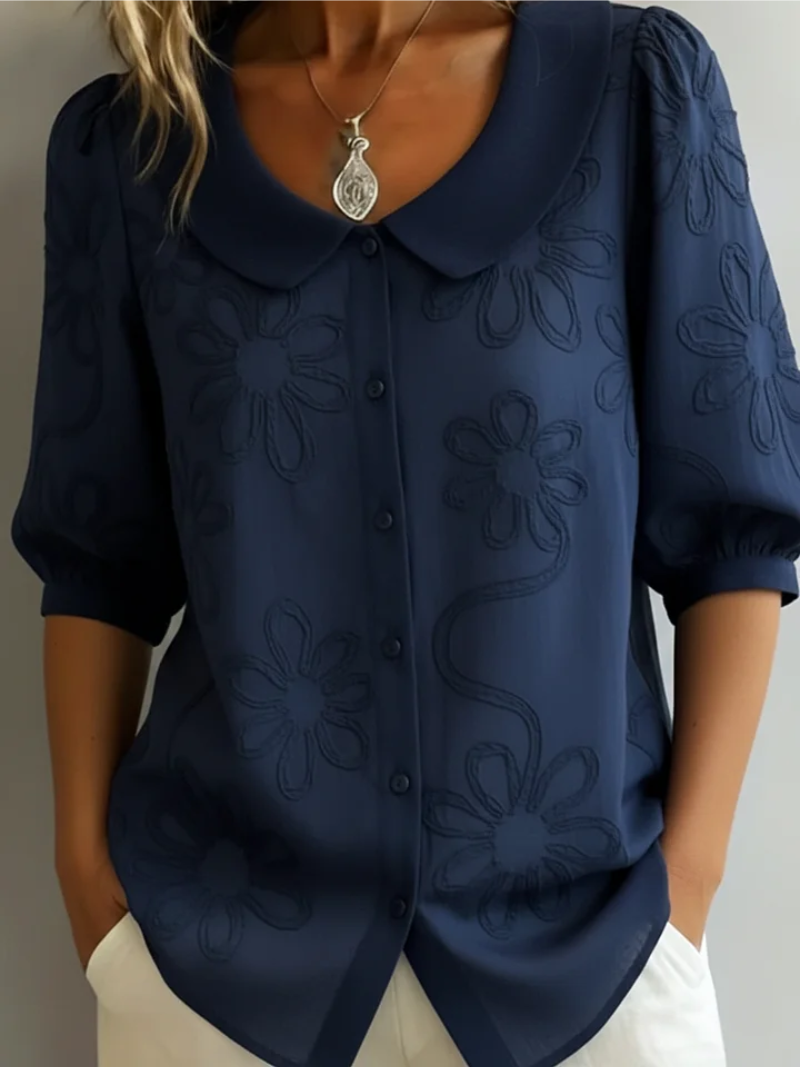 Sara – Blusa con fiori ricamati