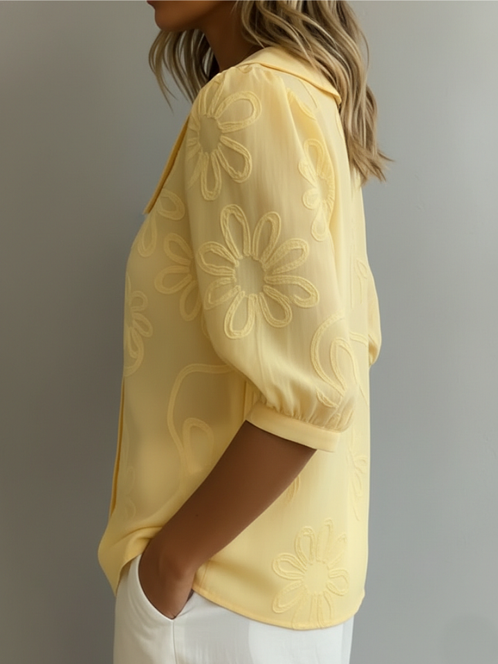 Sara – Blusa con fiori ricamati